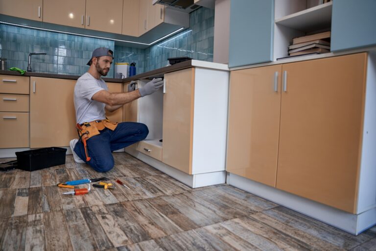 contractor in kitchen, header image for how do interior designers work with contractors image